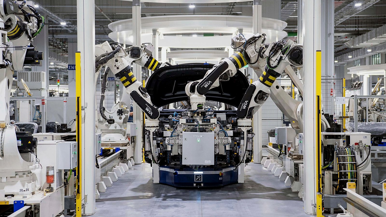 Automotive body-in-white production line with robotic welding stations